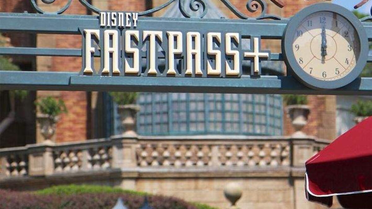 Fast Track Sign Disney Disney to lift limits on FastPass+ system starting Monday