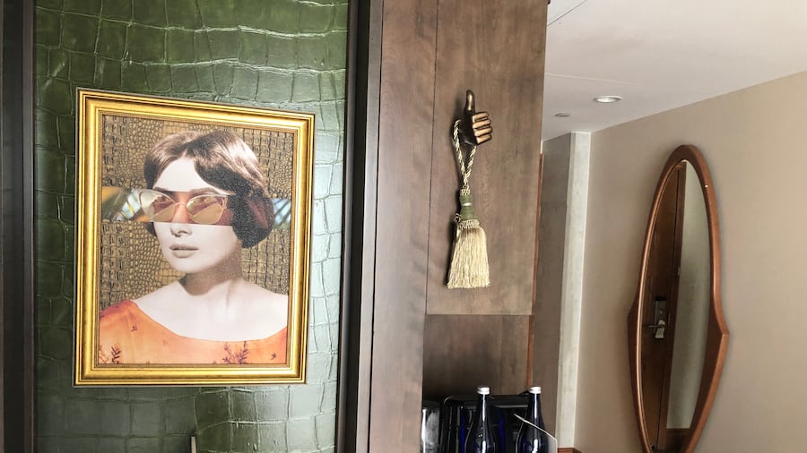 A wall slides open to the back of the shower in The Ben hotel in West Palm Beach. A wall slides open to the back of the shower in The Ben hotel in West Palm Beach.