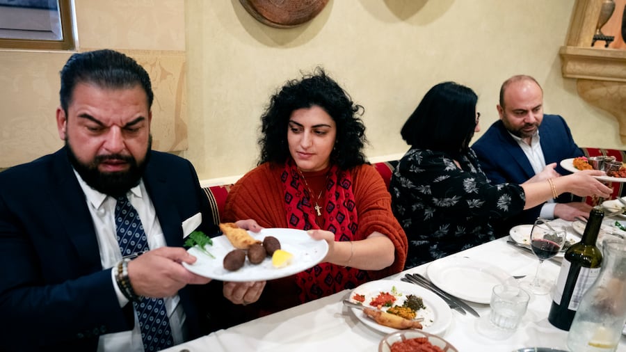 Sophia Armen, center passes a dish to Dr. Armond Aghakhanian and joined for lunch with other members of the Armenian-American Census Coalition, Suzie Abajian and former California Assembly Member Adrian Nazarian at the Carousel, a Lebanese-Armenian restaurant in Glendale, Calif. on Friday, May 17, 2024. For some race and ethnic groups, how the U.S. government categorizes them for crucial surveys and the once-a-decade census is still falling short. Hmong as well as Armenian, Arab American and Brazilian communities say they feel excluded or diminished when it comes to how they are counted in their own country. (AP Photo/Richard Vogel) Sophia Armen, center passes a dish to Dr. Armond Aghakhanian and joined for lunch with other members of the Armenian-American Census Coalition, Suzie Abajian and former California Assembly Member Adrian Nazarian at the Carousel, a Lebanese-Armenian restaurant in Glendale, Calif. on Friday, May 17, 2024. For some race and ethnic groups, how the U.S. government categorizes them for crucial surveys and the once-a-decade census is still falling short. Hmong as well as Armenian, Arab American and Brazilian communities say they feel excluded or diminished when it comes to how they are counted in their own country. (AP Photo/Richard Vogel)
